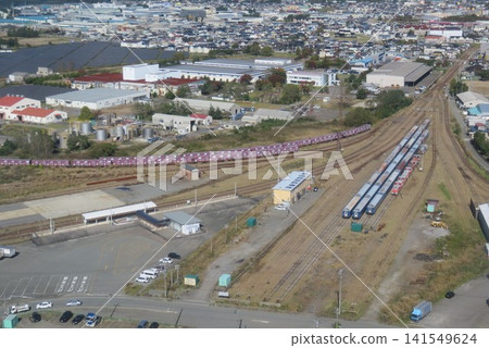 Blue train cars destined for disposal, which were being held at Akita Port. Blue train cars destined for disposal, which were being held at Akita Port. 141549624