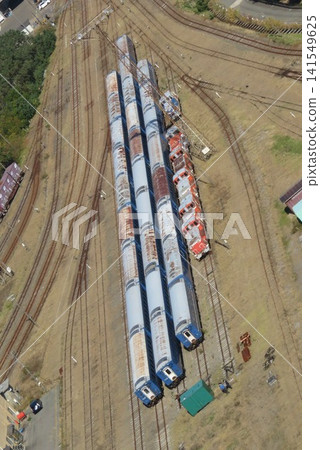 Blue train cars destined for disposal, which were being held at Akita Port. Blue train cars destined for disposal, which were being held at Akita Port. 141549625