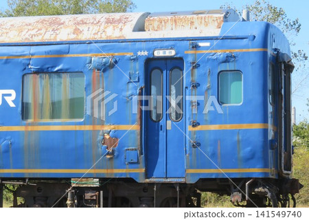Blue train cars destined for disposal, which were being held at Akita Port. Blue train cars destined for disposal, which were being held at Akita Port. 141549740