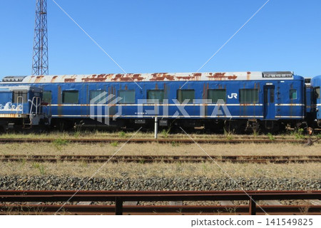 Blue train cars destined for disposal, which were being held at Akita Port. Blue train cars destined for disposal, which were being held at Akita Port. 141549825