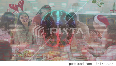 Sitting eight people wearing Santa hats and reindeer antlers at home table with neon brain hologram Sitting eight people wearing Santa hats and reindeer antlers at home table with neon brain hologram 141549922