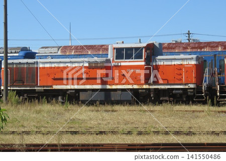 Blue train cars destined for disposal, which were being held at Akita Port. Blue train cars destined for disposal, which were being held at Akita Port. 141550486