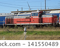 Blue train cars destined for disposal, which were being held at Akita Port. 141550489