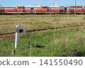 Blue train cars destined for disposal, which were being held at Akita Port. 141550490
