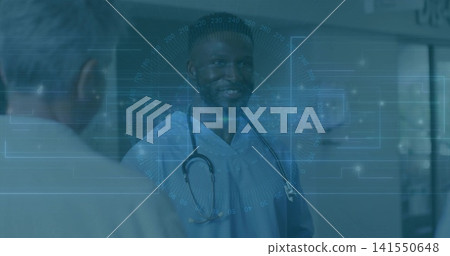 Smiling clinician in scrubs with stethoscope speaking and meeting gaze in hospital corridor with AR Smiling clinician in scrubs with stethoscope speaking and meeting gaze in hospital corridor with AR 141550648