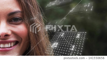 Smiling mid-adult woman showing left face portrait in foliage, with glowing dotted 1 grid Smiling mid-adult woman showing left face portrait in foliage, with glowing dotted 1 grid 141550656
