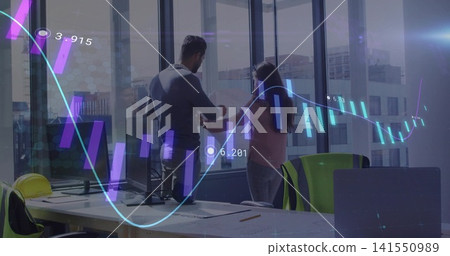 Consulting two staff gesturing at tablet in office with monitors, hard hat, holographic charts 141550989