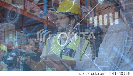 Reviewing tablet, warehouse worker in yellow hardhat neon vest checking stock with AR HUD Reviewing tablet, warehouse worker in yellow hardhat neon vest checking stock with AR HUD 141550996