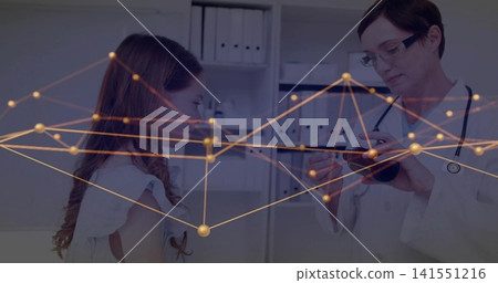 Writing doctor in white coat consulting child patient in clinic, holding tablet stethoscope overlay Writing doctor in white coat consulting child patient in clinic, holding tablet stethoscope overlay 141551216