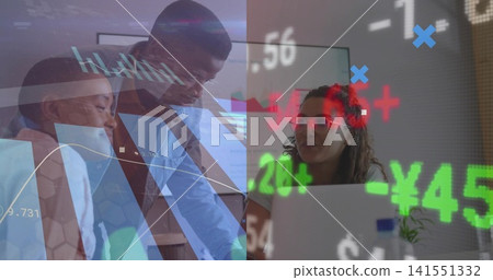 Reviewing financial charts, office team in blazers, glasses leaning over laptop, with stock tickers Reviewing financial charts, office team in blazers, glasses leaning over laptop, with stock tickers 141551332