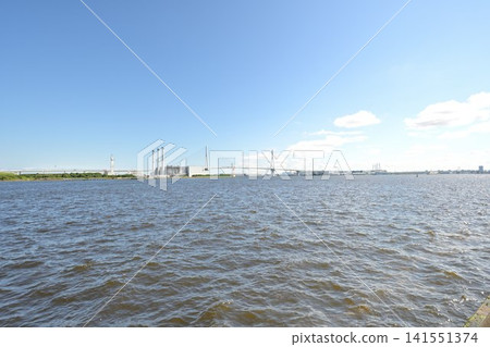 Blue sky, sea, and industrial area Blue sky, sea, and industrial area 141551374
