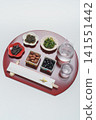 Japanese sake (chilled) and Japanese food, half-moon shaped tray and chopstick wrapper with the character for "longevity" | White background Japanese sake (chilled) and Japanese food, half-moon shaped tray and chopstick wrapper with the character for "longevity" | White background 141551442