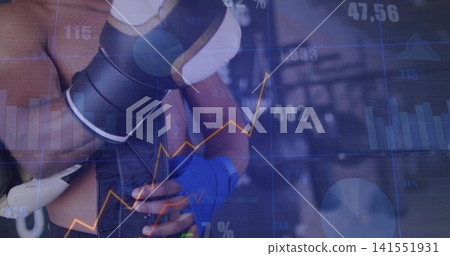 Training male boxer tightening blue handwraps at gym, with black-and-white glove and data overlays Training male boxer tightening blue handwraps at gym, with black-and-white glove and data overlays 141551931