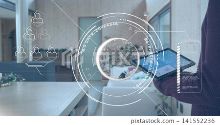 Projecting AR globe floating over open office, presenter standing holding tablet in dark sweater Projecting AR globe floating over open office, presenter standing holding tablet in dark sweater 141552236