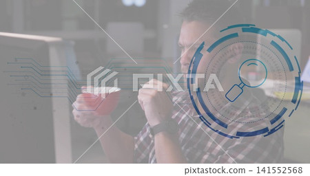 Man in plaid shirt holding red cup, spoon watching monitor at office, HUD graphics, copy space Man in plaid shirt holding red cup, spoon watching monitor at office, HUD graphics, copy space 141552568