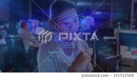 Interacting striped-blouse woman tapping tablet with stylus at office, showing face ID overlay Interacting striped-blouse woman tapping tablet with stylus at office, showing face ID overlay 141552569