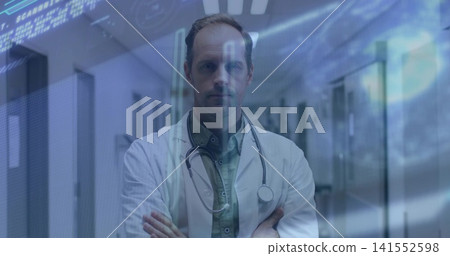 Standing male physician wearing white coat and stethoscope in clinic corridor, with digital overlay Standing male physician wearing white coat and stethoscope in clinic corridor, with digital overlay 141552598
