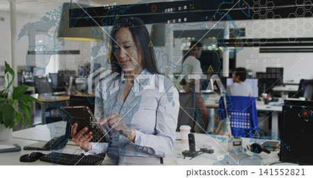 Holding tablet Korean woman wearing blouse and skirt tapping screen in open office with AR overlay 141552821
