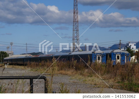 Blue train cars destined for disposal, which were being held at Akita Port. Blue train cars destined for disposal, which were being held at Akita Port. 141553062