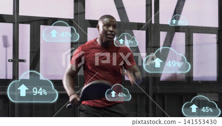Sprinting man in red shirt dark shorts gripping cardio bars in gym, cloud overlays with percent 141553430