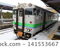 A KiHa 40 diesel train stopped at Furano Station. 141553667