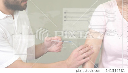 Holding syringe, nurse in white polo steadying injection in upper arm, pink tee, at clinic overlays Holding syringe, nurse in white polo steadying injection in upper arm, pink tee, at clinic overlays 141554381