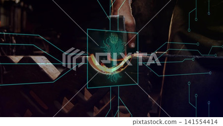 Forging worker in apron hammering glowing curved metal on anvil at forge, with teal overlay 141554414