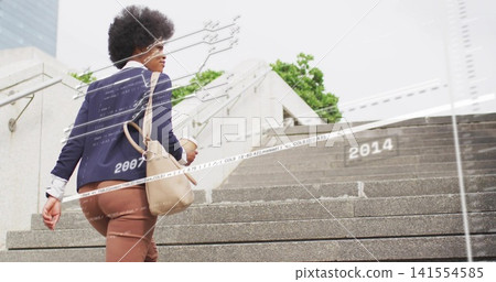 Climbing woman in blazer and pants up plaza stairs, carrying tan bag, coffee, overlays, copy space Climbing woman in blazer and pants up plaza stairs, carrying tan bag, coffee, overlays, copy space 141554585