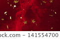 Floating gold five-pointed star confetti drifting across crimson smoke backdrop, with highlights 141554700