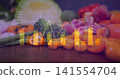 Showing cherry tomato cluster with carrots, broccoli and cucumber on wood board, analytics overlay 141554704