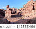 Picturesque scenery of Charyn Canyon in the sunset light, northern region of Tien Shan Mountains. Famous landmark Natural monument Valley of Castles, National Nature Park, Almaty region, Kazakhstan 141555469