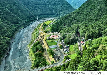 Aerial photograph capturing the rivers and mountain ranges of Kawanehoncho, Shizuoka Prefecture. Aerial photograph capturing the rivers and mountain ranges of Kawanehoncho, Shizuoka Prefecture. 141555975