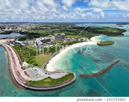Sunset Beach and the blue sea of Miyako Island on a clear day: A tropical photo perfect for tourism posters and web materials. Sunset Beach and the blue sea of Miyako Island on a clear day: A tropical photo perfect for tourism posters and web materials. 141555981
