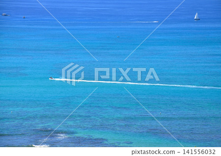 Blue ocean and boats at Waikiki Beach Blue ocean and boats at Waikiki Beach 141556032