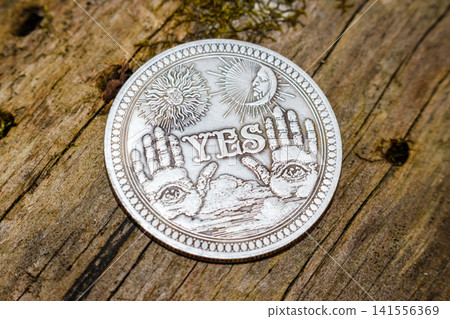 Souvenir coin for making a decision with the word Yes dropped 141556369