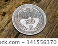 Souvenir coin for making a decision with the word No dropped 141556370