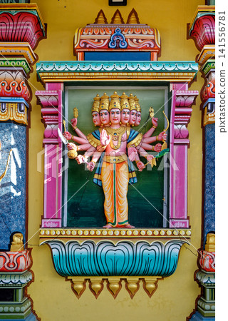 Ornate Sculptures and Painted Deities at Hindu Temple Ornate Sculptures and Painted Deities at Hindu Temple 141556781