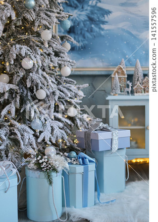 Frosted Christmas Tree and Wrapped Gifts Frosted Christmas Tree and Wrapped Gifts 141557596