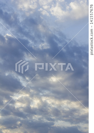 It is a cloudy late afternoon sky. It is a cloudy late afternoon sky. 141557676