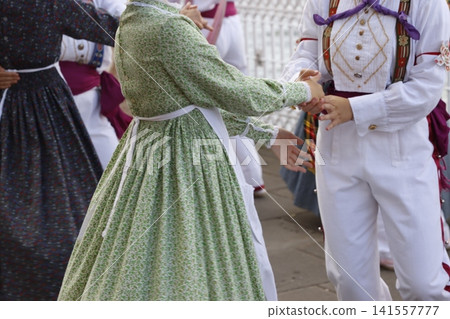 Traditional Basque dance in a folk festival Traditional Basque dance in a folk festival 141557777