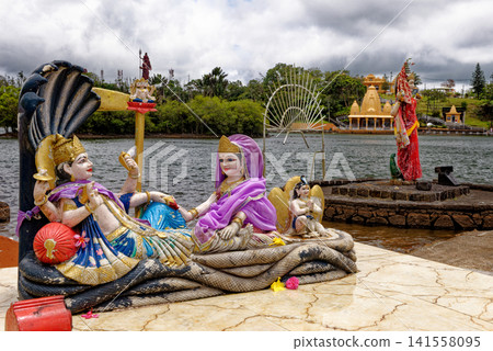 Lord Vishnu and Lakshmi Sheshashayana Statues at Ganga Talao, Mauritius Lord Vishnu and Lakshmi Sheshashayana Statues at Ganga Talao, Mauritius 141558095