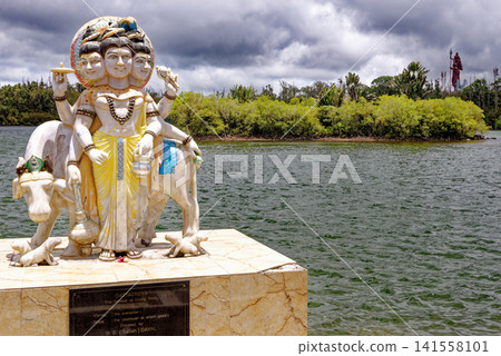 Three-Headed Lord Dattatreya Statue at Ganga Talao, Mauritius Three-Headed Lord Dattatreya Statue at Ganga Talao, Mauritius 141558101