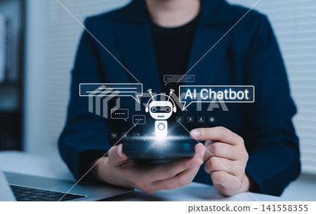 AI Chatbot Virtual Assistant Technology Concept. Woman holding smartphone with AI chatbot interface, representing communication, automation, and assistant services powered by artificial intelligence. AI Chatbot Virtual Assistant Technology Concept. Woman holding smartphone with AI chatbot interface, representing communication, automation, and assistant services powered by artificial intelligence. 141558355