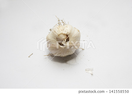 Garlic on a white background. 141558550