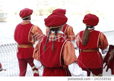 Parade in traditional Italian costume Parade in traditional Italian costume 141558592