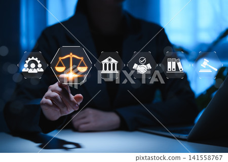 Law and Justice Concept. A suited legal professional touches virtual icons symbolizing law, justice, legal services. lawyer, business legislation, notary public, online legal advice, practice of law, 141558767