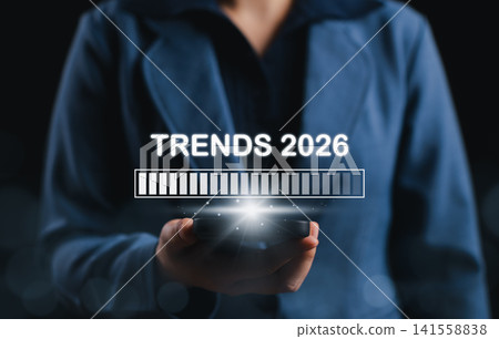Trends 2026 Future Business and Technology Concept. Businessperson holding phone with loading bar and Trends 2026, future business forecast, innovation, transformation, seo trends 2026, progress bar, Trends 2026 Future Business and Technology Concept. Businessperson holding phone with loading bar and Trends 2026, future business forecast, innovation, transformation, seo trends 2026, progress bar, 141558838