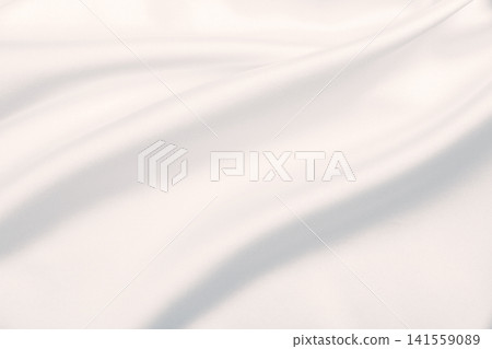 Smooth elegant grey silk or satin luxury cloth as wedding background. Luxurious background design Smooth elegant grey silk or satin luxury cloth as wedding background. Luxurious background design 141559089