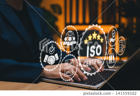 ISO Certification and quality management concept. Businesswoman using laptop with ISO certified and quality assurance icon, international standards, compliance, quality management systems, certificate ISO Certification and quality management concept. Businesswoman using laptop with ISO certified and quality assurance icon, international standards, compliance, quality management systems, certificate 141559102
