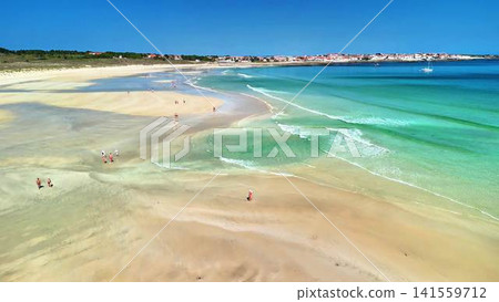Explore a breathtakingly Scenic Beach View featuring Golden Sand and Clear Water that captivates Explore a breathtakingly Scenic Beach View featuring Golden Sand and Clear Water that captivates 141559712